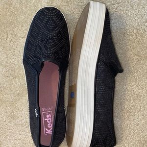 Black Keds platform slip on sneakers